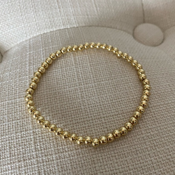 NWOT Gold tone elastic bead bracelet - Picture 2 of 4